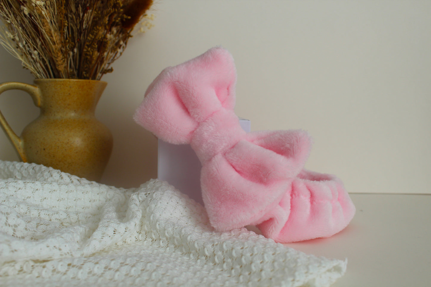 Bandeau doudou rose bébé